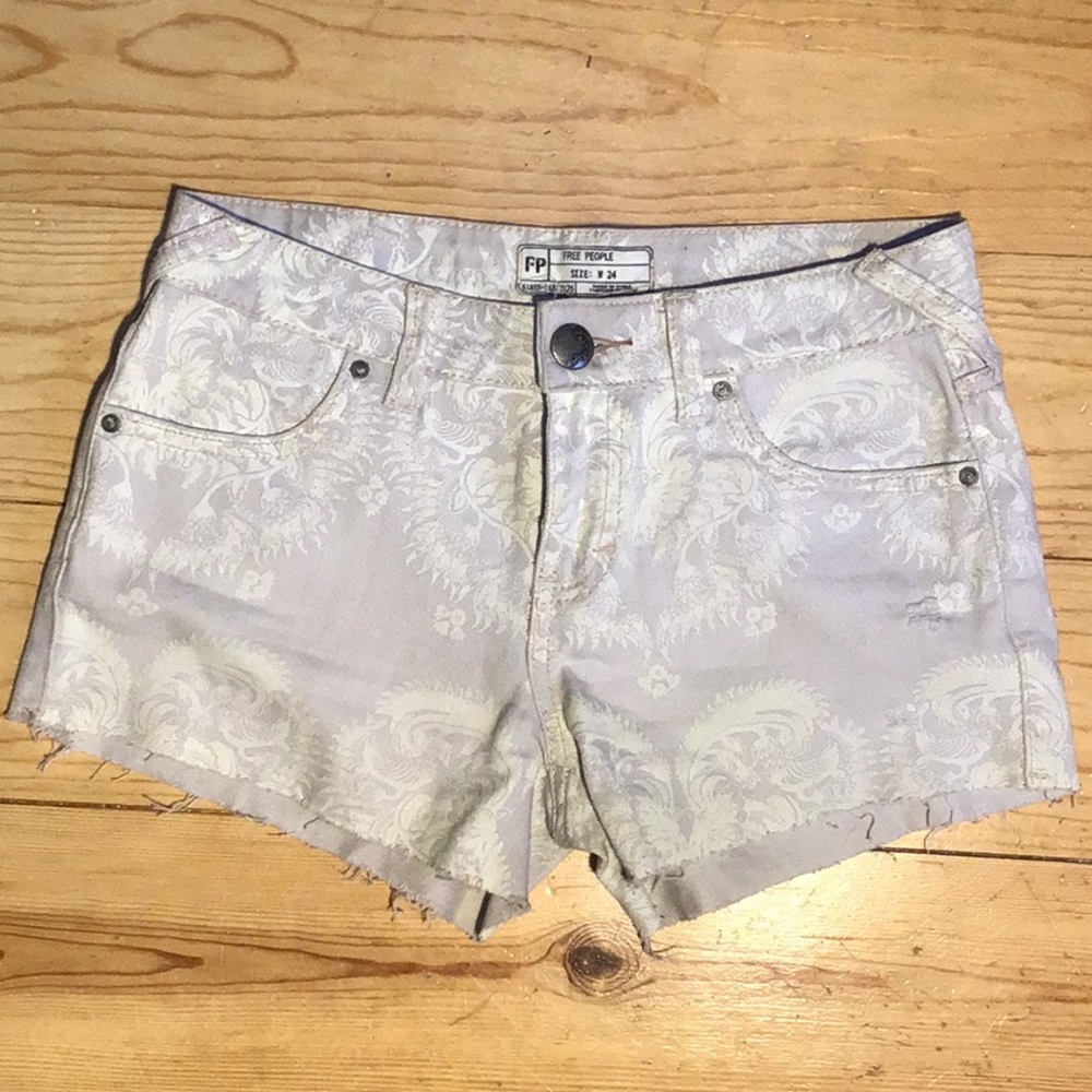 Free People distressed floral shorts